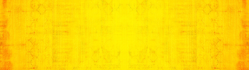 Old yellow vintage worn shabby patchwork motif tiles stone concrete cement wall wallpaper texture background banner panorama pattern