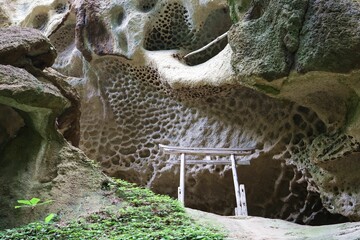 Yamadera, Yamagata City, Yamagata Prefecture, Japan, August 2022.The rock face of Tarumizu ruins.