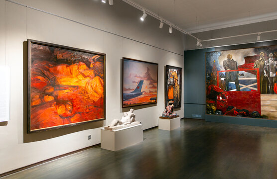 Exhibition of paintings in the art gallery. Modern art and traditional soviet painting
