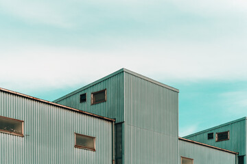 Fototapeta na wymiar Old industrial building against overcast sky