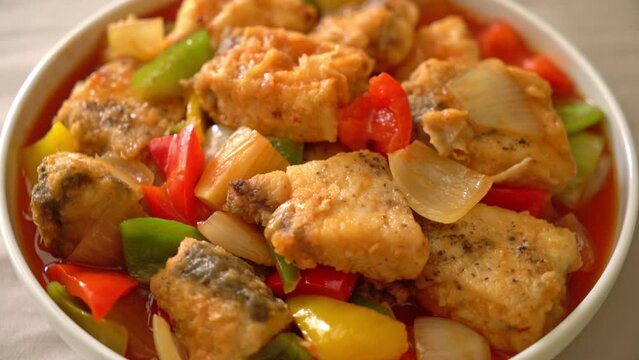 fish stew with tomato and pepper on plate