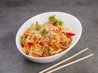 spaghetti with vegetables in Asian style. concept: vegetarianism