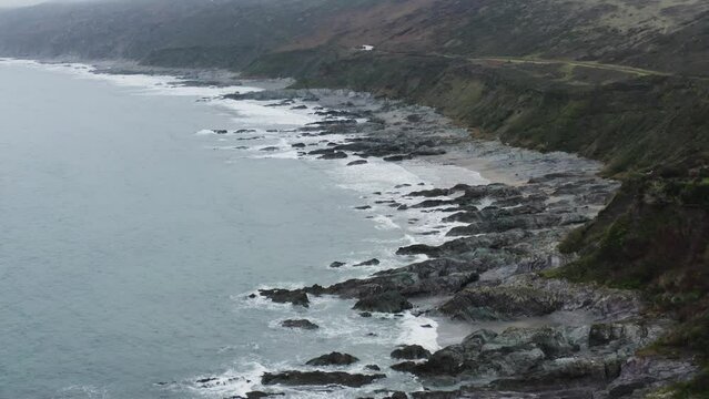 Rugged Coastline Of Rame Head In Torpoint Near Polhawn Fort In Cornwall, United Kingdom. Aerial Drone Shot