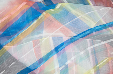 Wavy abstract blurred background. Rainbow surface. View from above.