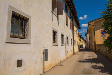 Fototapeta na wymiar A quiet back street in the historic Borgo Brossana area of Cividale del Friuli, Udine Province, Friuli-Venezia Giulia, north east Italy 