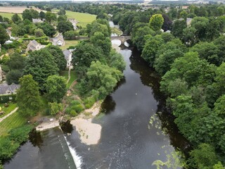 Fototapeta premium Aerial view of Boston Spa small village and remote suburb of civil parish in the City of Leeds metropolitan borough in West Yorkshire, England