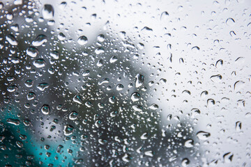 Raindrops on the background glass.