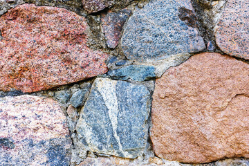 stone masonry wall texture background close up