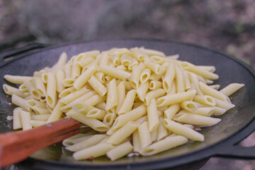 Cooking pasta in a pan