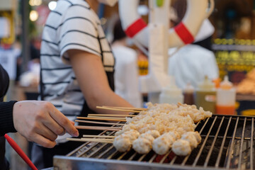 Raw fresh jellyfish skewer for grill eat with hot and spicy sauce,Appetizer meal seafood street food Thailand