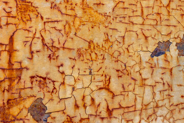 Fototapeta na wymiar Rusty burnt metal of armored vehicles. metal texture with scratches and cracks
