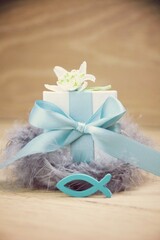 Gift box with fish as a symbol for confirmation, communion, baptism - greeting card	
