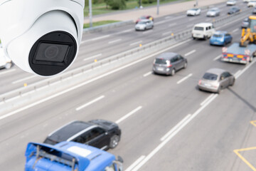 Obraz premium CCTV cameras on the overpass for recording on the road for safety and traffic violations