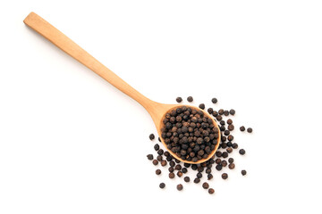 Black pepper or peppercorns in wooden spoon isolated on white background , top view , flat lay.