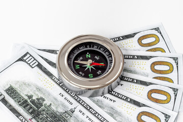 Compass and money cash - exchange rate change concept