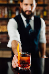 barman preparing cocktail in bar