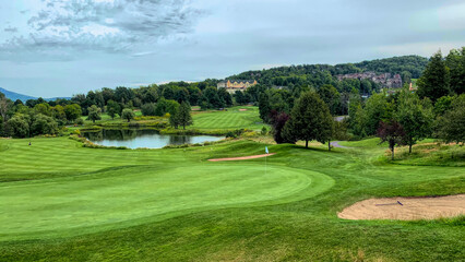 Fototapeta na wymiar Golf Chateau Bromont on a beautiful summer day at the foot of Mont Bromont 