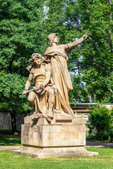 Obraz premium sculpture of slavic mythical figures - statues of Premysl and Libuse on pedestal in Vysehrad, Prague, Czech republic