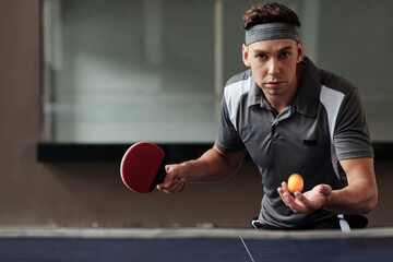 Sportsman Serving Table Tennis Ball - obrazy, fototapety, plakaty