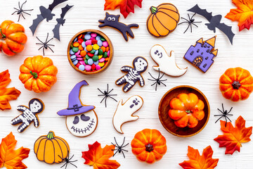 Halloween party background flat lay with gingerbread cookies