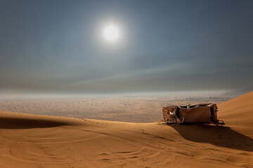 abandoned car in desert © Nilton