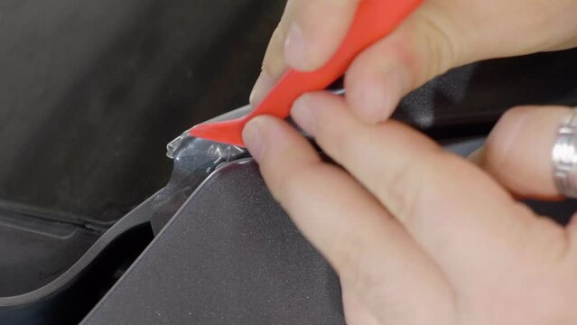 Close Up Car Wrapping with Grey Foil, Detailed Craftsmanship with Tool