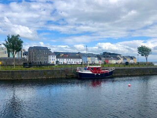 Fototapeta premium Irish city Galway panoramic view, West of Ireland, province of Connacht, County Galway. Best Irish countryside towns. Best Irish landscape photos. Popular Irish tourist attractions