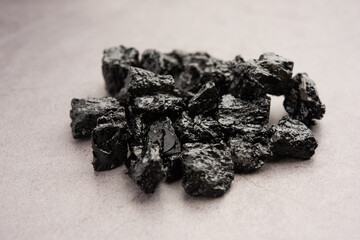 Shilajit is an ayurvedic medicine found primarily in the rocks of the Himalayas. selective focus