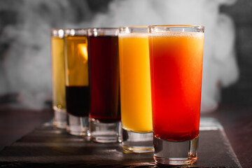 the bartender prepares an alcoholic cocktail