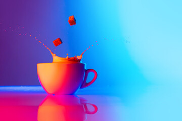 Sugar please. Cup of coffee with milk standing on mirror surface over gradient blue white...