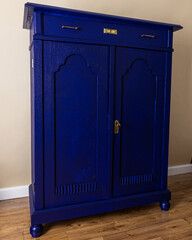 Blue painted furniture after renovation has second life