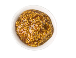  mustard in round dish from above on white.