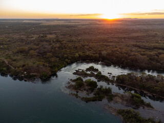 amazing red sunset under tocantins river in brazilian forest nature