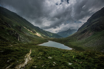 A stormy and very photogenic walk through the alpine mountains near Bad Gastein. - Powered by Adobe