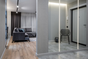 empty corridor in interior of entrance hall of modern apartments