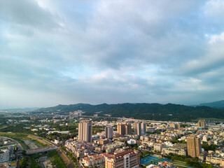 Taichung City, Taiwan - Aug 23, 2022 : Aerial view of Taichung city Beitun District skyline horizon in sunset time. Residential estate concept.