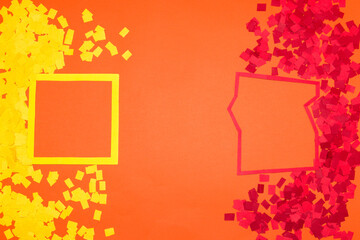 
yellow and red frame on different sides of orange background next to frames and chopped paper of the same colors, creative art design