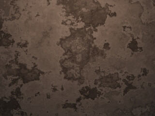 Brown soil wall background. Highly weathered rock surface texture.