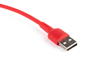 Close-up of a red USB cable on a white background.