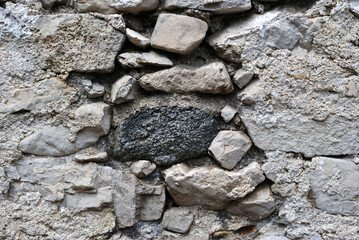 Rough Textured Rocks in Ancient Stone Wall