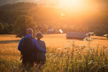 Joyful couple relaxing in nature