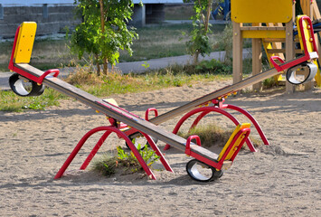 A fragment of an attraction on a children's playground on a summer morning