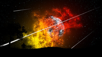 A man sitting on a bench at night under a tree watches the explosion and destruction of the planet in a bright red-yellow nebula in the starry sky with falling meteors.