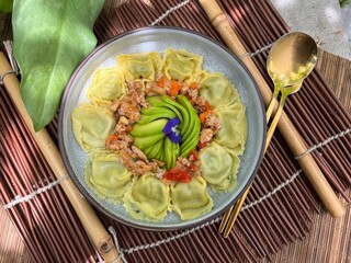 Ravioli stuffed with chopped spinach Parmesan Cheese and Ricotta Cheese with avocados