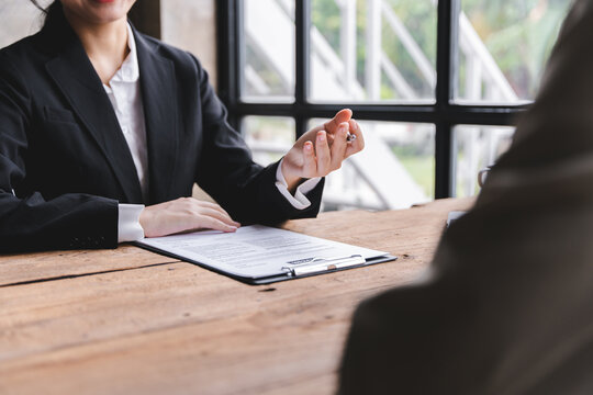 Portrait of a person interviewing for a job and.Submit resume to staff job application concept