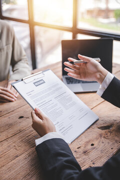 Portrait of a person interviewing for a job and.Submit resume to staff job application concept