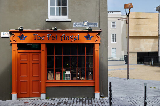 WATERFORD - IRELAND - MAY 21-2021 waterford city pub cafe with red colors and fat angel letters