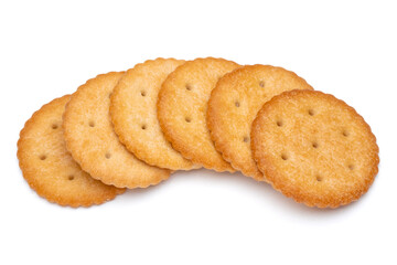 Healthy whole wheat cracker on white background. Stack of Saltine crackers isolated on white background. Round crackers.