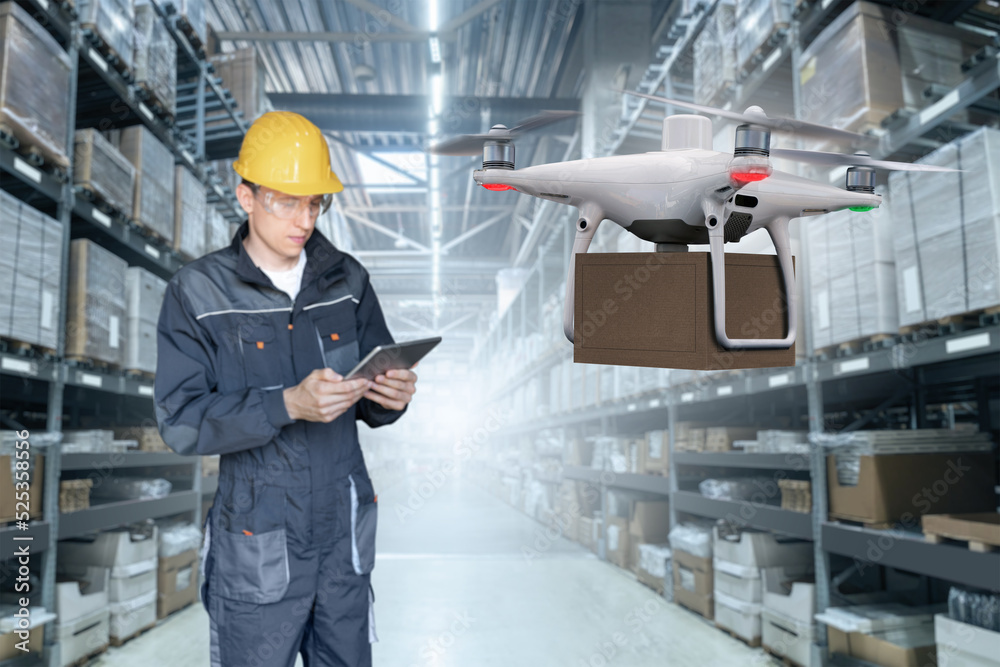 Aufkleber Warehouse manager with digital tablet controls drone with a package. Unmanned delivery concept