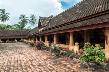 Wat Si Saket Temple in Vientiane, Laos. It was built in the Siamese style of Buddhist Art, with a surrounding terrace and an ornate five-tiered roof
